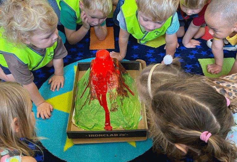 Group of children looking at an activity at cornerstone kids