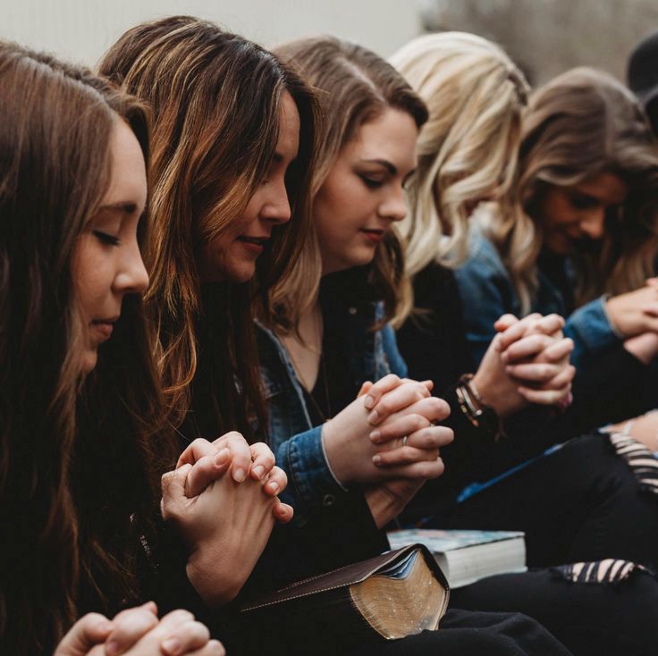 Group of ladies praying
